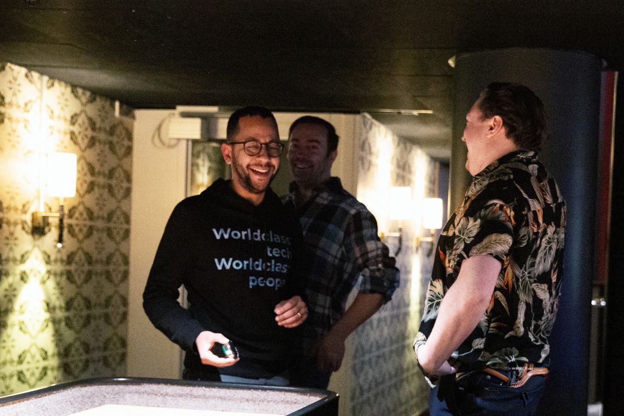Ivo smiling while playing shuffleboard
